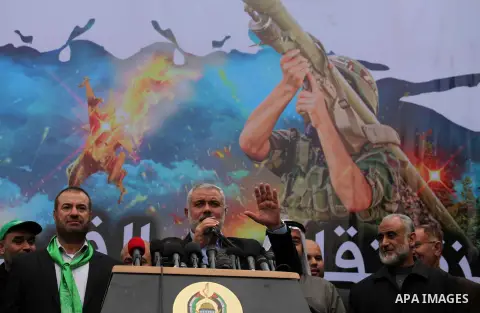 Senior Hamas leader Ismail Haniyeh, speaks during a rally ahead of the 27th anniversary of the movement founding, in Jabaliya in the northern Gaza Strip December 12, 2014. Photo by Ashraf Amra