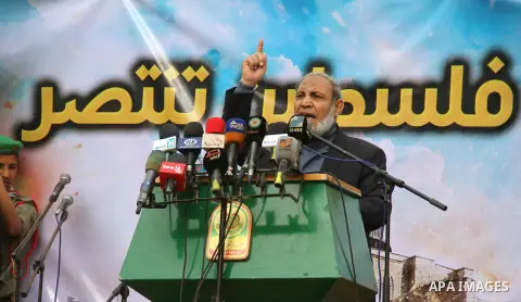 Senior Hamas leader Mahmoud al-Zahhar, speaks during a rally ahead of the 27th anniversary of the movement founding, in Khanm Younis in the southern Gaza Strip December 12, 2014. Photo by Ramadal El-Agha