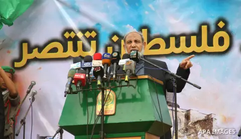 Senior Hamas leader Mahmoud al-Zahhar, speaks during a rally ahead of the 27th anniversary of the movement founding, in Khanm Younis in the southern Gaza Strip December 12, 2014. Photo by Ramadal El-Agha