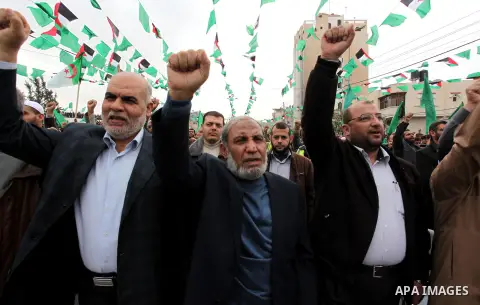 Senior Hamas leader Mahmoud al-Zahhar, takes part in a rally ahead of the 27th anniversary of the movement founding, in Khanm Younis in the southern Gaza Strip December 12, 2014. Photo by Ramadal El-Agha