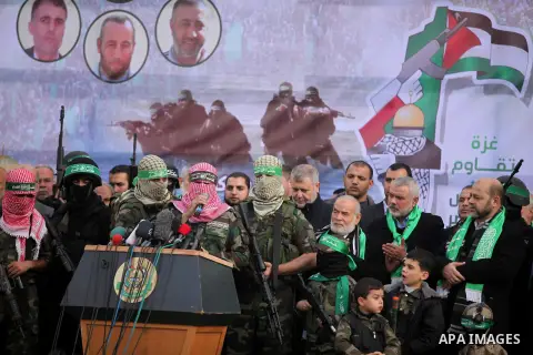 Abu Obaida, the spokesman for the Ezzedine Al-Qassam Brigades, Hamas's armed wing, speaks during rally marking the 27th anniversary of Hamas' founding, in Gaza City December 14, 2014. Photo by Ashraf Amra