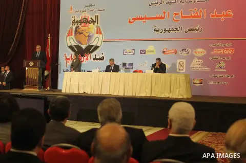 Egyptian Prime Minister Ibrahim Mahlab speaks during a conference on combating terrorism, in Cairo on December 14, 2014. Photo by Amr Sayed