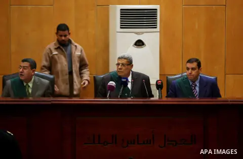 The Judge speaks during the trial of Gamal and Alaa Mubarak, sons of former president Hosni Mubarak in Cairo, December 18, 2014. The two sons of Egypt's former president were back in court facing charges of stock market...