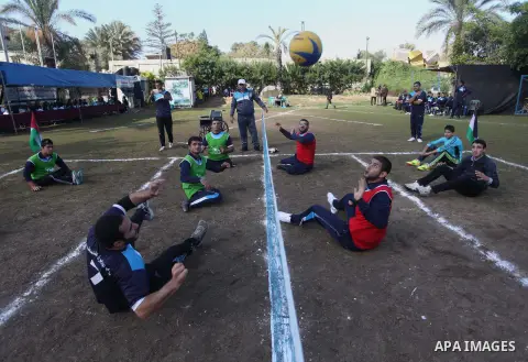 Palestinians disabled participate in an athletics championship for disabled, at Al-Jazeera Club in Gaza city on December 20, 2014. Photo by Ashraf Amra