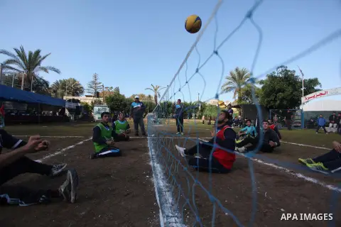 Palestinians disabled participate in an athletics championship for disabled, at Al-Jazeera Club in Gaza city on December 20, 2014. Photo by Ashraf Amra