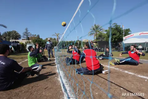 Palestinians disabled participate in an athletics championship for disabled, at Al-Jazeera Club in Gaza city on December 20, 2014. Photo by Ashraf Amra