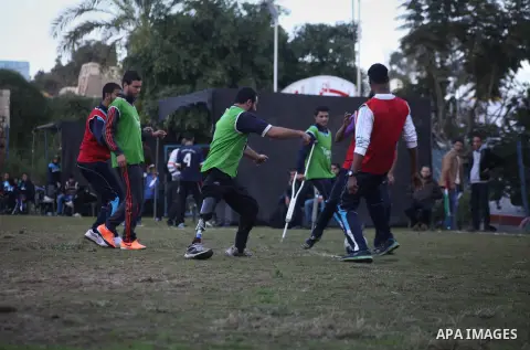 Palestinians disabled participate in an athletics championship for disabled, at Al-Jazeera Club in Gaza city on December 20, 2014. Photo by Ashraf Amra