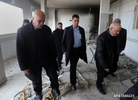 FIFA's senior development manager for Asia, David Borja inspects Al-Shatie club headquarter which was damaged during the recent Israeli offensive in Gaza Strip, in Gaza city on January 6, 2015 in Gaza City. Borja, along...