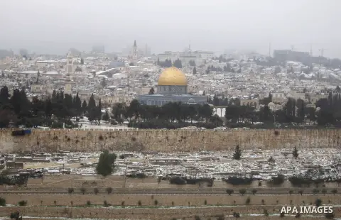 The Dome of the Rock is seen during a gust of wind outside Jerusalem's Old City January 8, 2015. A storm buffeted the Middle East with blizzards, rain and strong winds on Wednesday, keeping people at home across the regi...