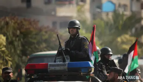 Members of Palestinian security forces loyal to Hamas take part in a parade marking the sixth anniversary of the death of former Hamas interior minister Saeed Seyam, in Gaza City January 18, 2015. Seyam was killed by an...