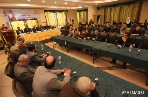 Members of Palestinian factions attend a meting in Gaza city, on January 24, 2015. Photo by Mohammed Asad