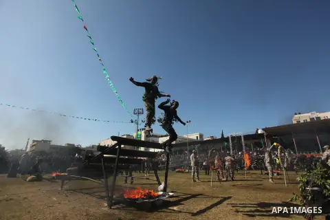 Palestinian youths demonstrate their skills during a graduation ceremony of a military-style camp organized by the Hamas movement in Gaza City on January 29, 2015. Hamas's armed wing organized "Liberation Youths Camps" f...