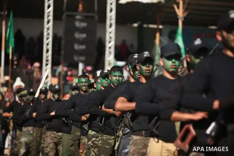 Palestinian youths demonstrate their skills during a graduation ceremony of a military-style camp organized by the Hamas movement in Gaza City on January 29, 2015. Hamas's armed wing organized "Liberation Youths Camps" f...