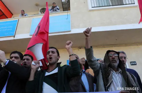 Palestinian protesters shout slogans during a protest organised by the Democratic Front for the Liberation of Palestine against United Nations, after the UN announced a lack of funds to rebuild the Palestinian territory,...