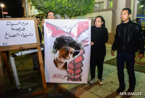 Egyptians attend a funeral of Shaima al-Sabbagh, who was killed during clashes with Egyptian police on January 24, in Cairo on Feburary 1, 2015. Al-Sabbagh was killed in clashes with Egyptian police, after suffering from...
