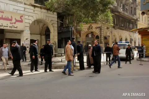 Egyptian soldiers stand guard on the blast site in downtown Cairo, Egypt, Feb. 3, 2015. A blast occurred at Talaat Harb square in downtown Cairo, leaving no casualties, an official source at Cairo Security Directorate wa...