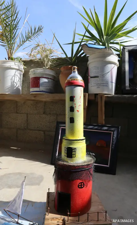 A painted model is displayed at an atelier in Rafah in the southern Gaza Strip, February 9, 2015. Three Palestinian artists use the remains of houses which were destroyed during the 51 day Israeli recent war on Gaza Stri...