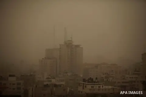 A sandstorm is seen over Gaza city on February 11, 2015. Photo by Ashraf Amra