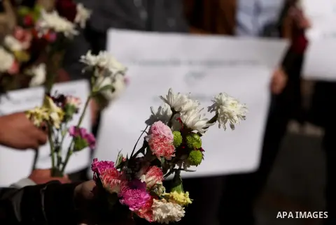 Palestinians gather to remember the Chapel Hill shooting victims, the three young Muslims who were gunned down in North Carolina this week, in Gaza City, February 14, 2015. Newlywed Deah Shaddy Barakat, 23, a University...