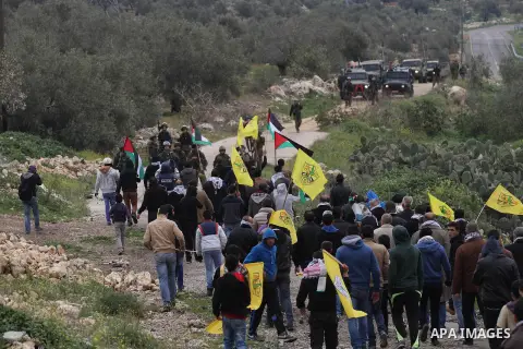 Palestinian protesters clashes with Israeli border policemen following a protest against closure of the village road, in the West Bank village of Azzun near Qalqilya February 14, 2015. Photo by Nedal Eshtayah