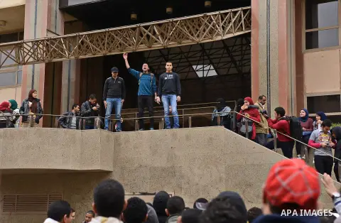 Egyptian students who are support ousted President Mohamed Morsi and the Muslim Brotherhood take part in a protest in Cairo University on February 15, 2015. Due to the escalation of students protest in the campus of seve...