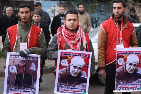 Palestinians take part a protest demanding the release of their relatives prisoners held in Israeli jails, in front of the Red Cross office in Gaza City, on February 16, 2015. Photo by Mohammed Asad