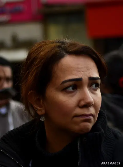A relative of one of the Egyptian Coptic men killed in Libya reacts during a demonstration to denounce the killing of Egyptian Christians in Libya, in Cairo,16 February 2015. An Islamic State video released on 15 Februar...