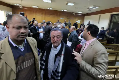 Former Egyptian oil minister Sameh Fahmy, reacts after a court overturned his conviction of selling cheap gas to Israel case at a court, in Cairo, Egypt, February 21, 2015. An Egyptian court acquitted former oil minister...
