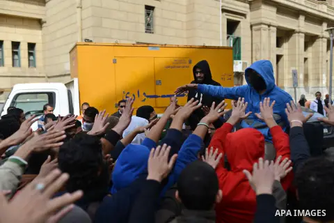 Egyptian students who are support ousted President Mohamed Morsi and the Muslim Brotherhood shout slogans during protest against the military rule, in Cairo University on February 24, 2015. Due to the escalation of stude...