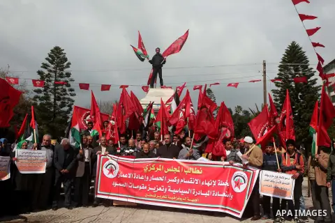 Palestinian supporters of the Popular Front for the Liberation of Palestine (PFLP) take part a protest demanding for reconstruction of houses which were destroyed during the recent Israeli war, in Gaza city, on March 04,...
