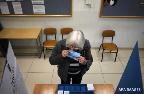 An Israeli woman casts her ballot at a polling station in the northern city of Haifa March 17, 2015. Millions of Israelis voted on Tuesday in a tightly fought election, with Prime Minister Benjamin Netanyahu facing an up...