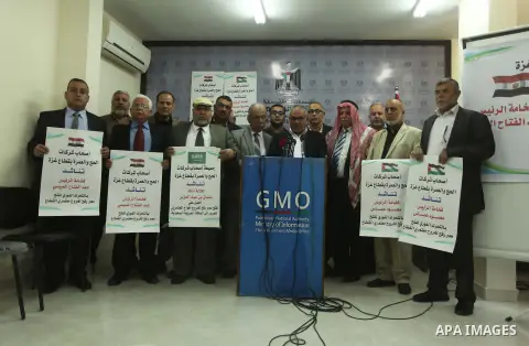 Awad Abu Mazkour, the head of the association representing pilgrimage agencies and travel companies, speaks during a press conference, in Gaza city on March 18, 2015. Some 50,000 Gazans typically travel for the umrah eac...