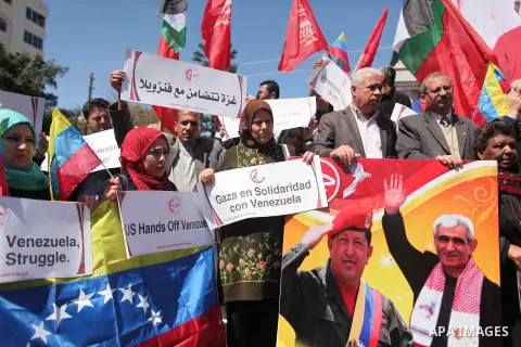 Palestinian supporters of the Popular Front for the Liberation of Palestine (PFLP) take part in a protest to show solidarity with the Venezuelan government after the United States imposed sanctions to Venezuela, in Gaza...