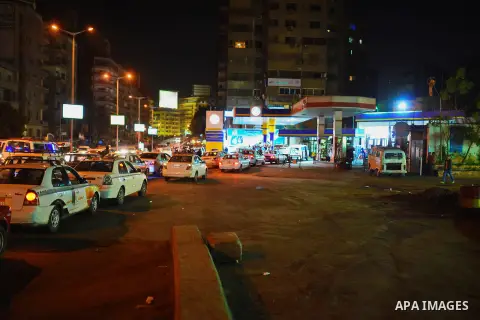 Egyptian drivers wait in line to refuel their cars at a gas station in Giza's district of Cairo, March 23, 2015. Egypt was once an energy exporter but declining oil and gas production and increasing consumption has force...