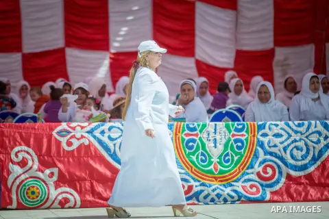 Egyptian women prisoners celebrate to mark the anniversary of Mother's Day, at El-Qanater jail, cairo, on March 23, 2015. Photo by Stringer