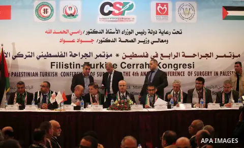 Palestinian prime minister Rami Hamdallah attends the Palestinian Turkish conference of surgery in Palestine during his visit to the Gaza Strip, in Gaza city on March 26, 2015. Hamdallah urged rival factions to set aside...