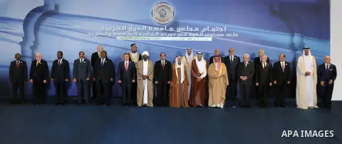 Egypt's President Abdel Fattah al-Sisi stands with Arab League heads in Sharm el-Sheikh, in the South Sinai governorate, south of Cairo, March 28, 2015. Arab League heads of state will hold a two-day summit to discuss a...