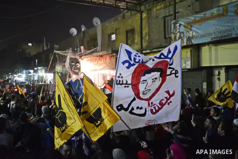 Egyptian students who support ousted President Mohamed Morsi and the Muslim Brotherhood take part in a demonstration in El-Sharabia in Cairo on March 28, 2015. Photo by Amr Sayed