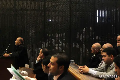 Relatives of Egyptians who were killed in the 'Port Said Massacre' attend a trial of defendants in Cairo on April 5, 2015. Port said Criminal court adjourned 73 defendants in the so-called Case Port Said Massacre retrial...