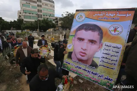 Palestinians take part in a symbolic funeral for the former Palestinian prisoner Jaafar Awad, who was recently released from Israeli jail, in Gaza city on April 11, 2015. Israeli troops shot dead Ziad Awad, the cousin on...