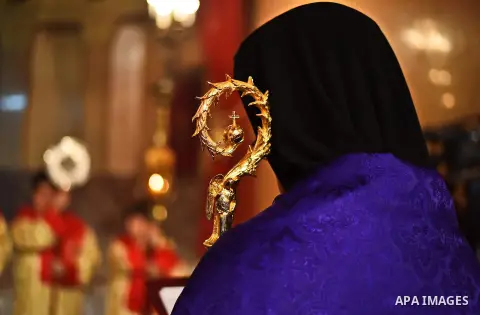 Egyptian Coptic Christians celebrate during a commemorate the 100th anniversary of the 1915 Armenian genocide at the Coptic Orthodox Church in Cairo on April 24, 2015. Historians estimate up to 1.5 million Armenians were...