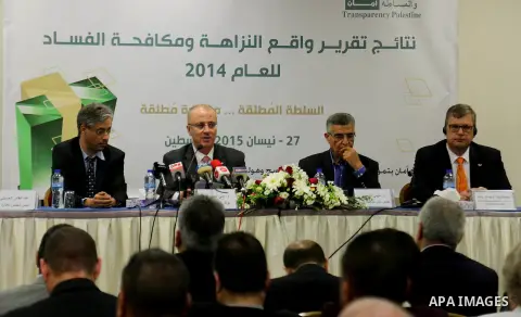 Palestinian Prime Minister Rami Hamdallah attends the ceremony of results of integrity and anti-corruption report 2014, in the West Bank city of Ramallah on April 27, 2015. Photo by Prime Minister Office