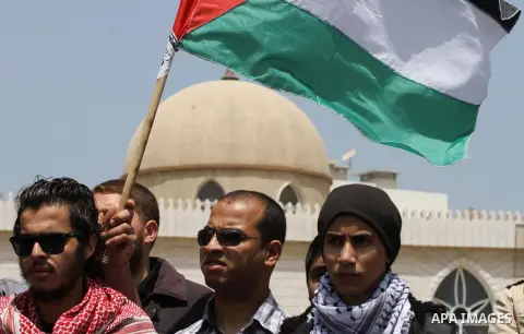Palestinian supporters of April 29," take part a rally in Gaza City, on April 28, 2015. Photo by Mohammed Asad