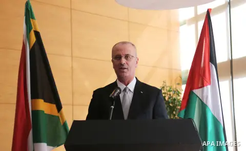 Palestinian Prime Minister Rami Hamdallah attends a celebration to commemorate the South Africa's Freedom Day, in the West Bank city of Ramallah, April 28, 2015. Photo by Prime Minister Office