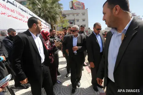 Palestinian Hamas leader Ismail Haniya attends a gathering to sign a symbolic document against Israel's settlements and separation barrier in the Palestinian Authority-controlled West Bank, on April 29, 2015 in Gaza City...