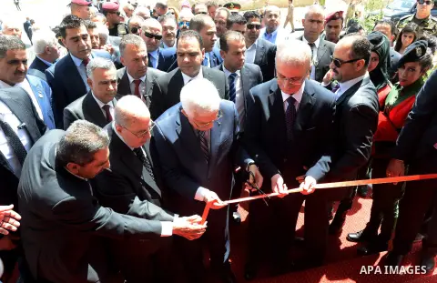 Palestinian President Mahmoud Abbas attends an opening ceremony, at al-Istiqlal University in the West Bank city of Jericho on May 1, 2015. Photo by Osama Falah