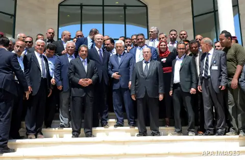 Palestinian President Mahmoud Abbas attends an opening ceremony, at al-Istiqlal University in the West Bank city of Jericho on May 1, 2015. Photo by Osama Falah