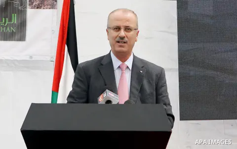 Palestinian Prime Minister Rami Hamdallah takes part in a ceremony opening The American Rayhan school in the West Bank city of Ramallah on May 07, 2015. Photo by Prime Minister Offic