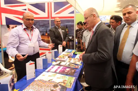 Palestinian Prime Minister, Rami Hamdallah, participates in a celebration to mark "Europe Day" in the West Bank city of Ramallah on May 7, 2015. Europe Day, also known as Schuman Day, is an annual celebration of peace an...