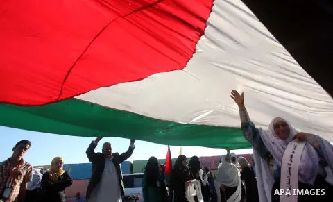 Palestinians take part in a rally ahead of the commemorations of the 67th anniversary of the ''Nakba'', at the Gaza seaport on May 7, 2015. ''Nakba'' means in Arabic ''catastrophe'' in reference to the birth of the state...
